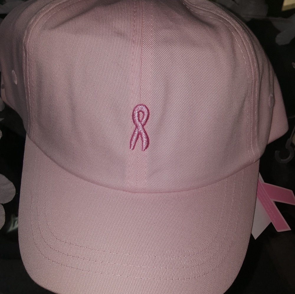Ball cap.  Pink hat. Pink breast cancer ribbon on front.